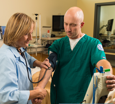 Nurse checking a student's blood pressure