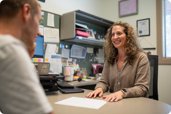 Advisor and advisee completing a worksheet