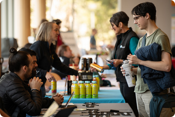 Students inquiring with potential employers at COCC JobFest