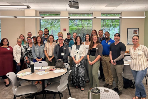 Group of Public Sector Employees smiling for a photo