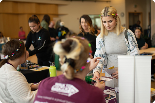 COCC student talking to an employer at COCC Job Fair