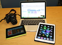 A laptop and DSLR camera