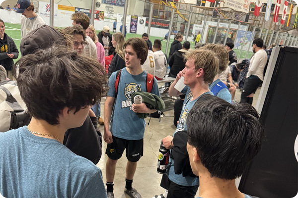 soccer players huddling after a game