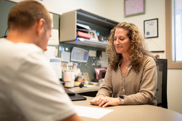 Advisor and student working on an academic plan during an advising session