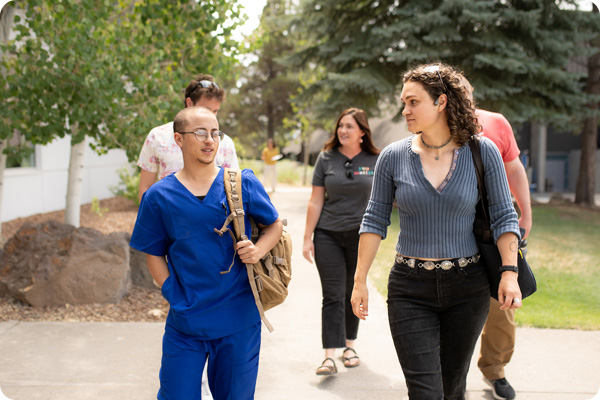 Veterans Club walking through upper campus of COCC Bend Campus